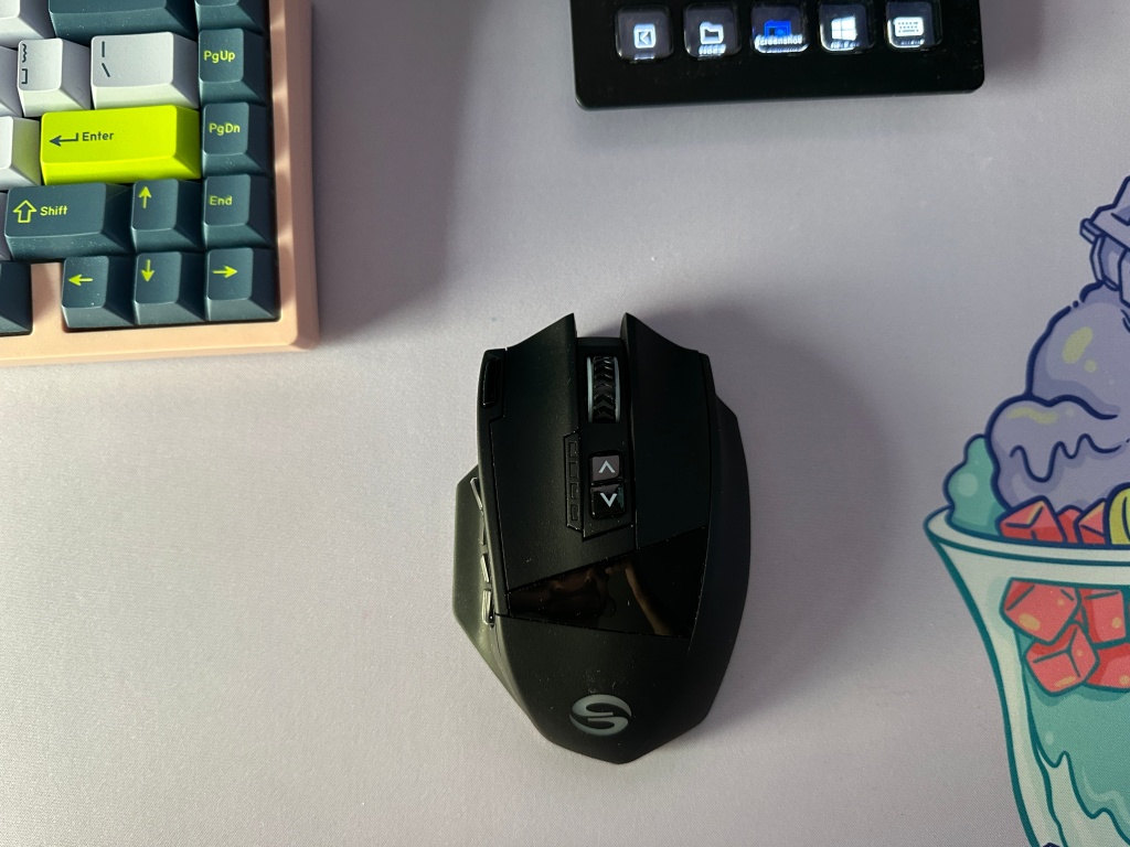 Top view of UtechSmart Venus Pro mouse at desk setup